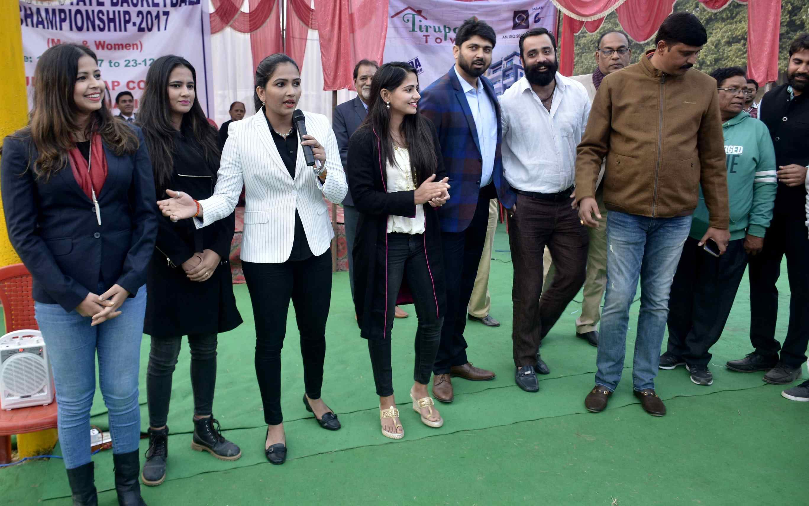singh sisters with another international basketball player reach up college