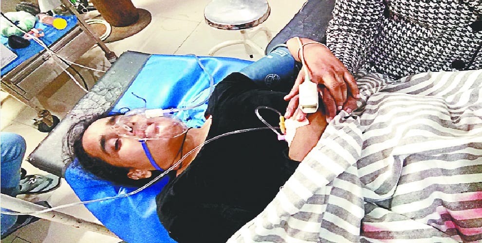 Wife to save husband, woman injured by firing