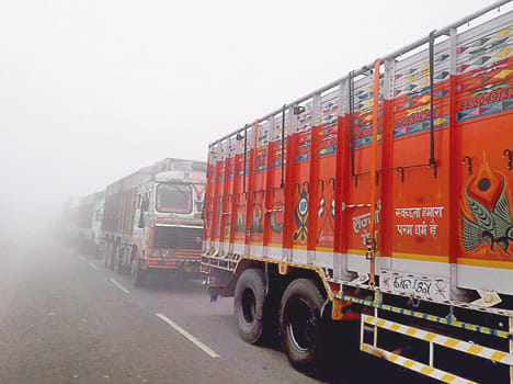 three truck and ambulence collision, 5 injured