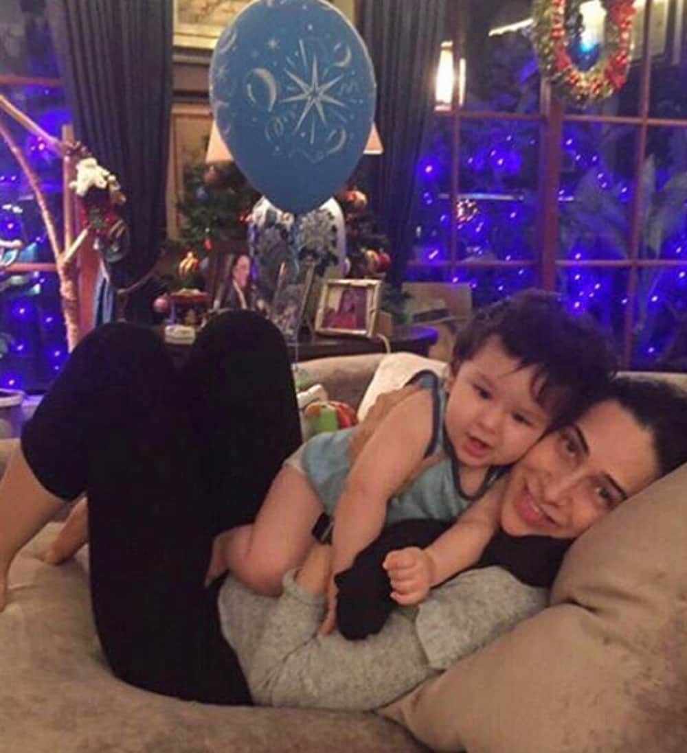 birthday boy taimur ali khan looks damn cute while playing with karishma kapoor