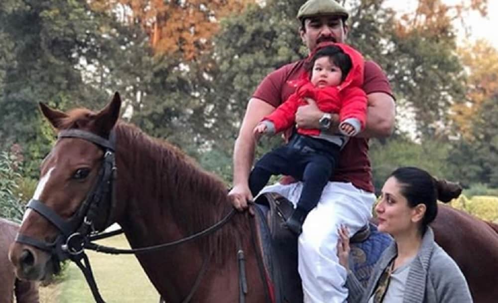 birthday boy taimur ali khan looks damn cute while playing with karishma kapoor