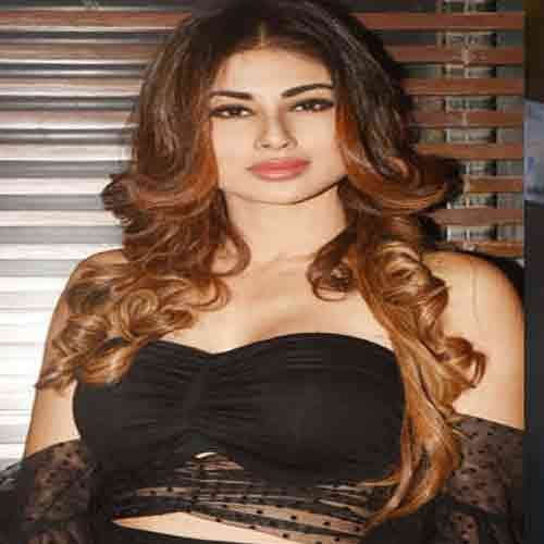 mouni roy show her boldness in back less dress enters in a party