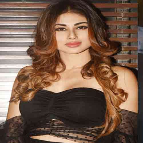 mouni roy show her boldness in back less dress enters in a party