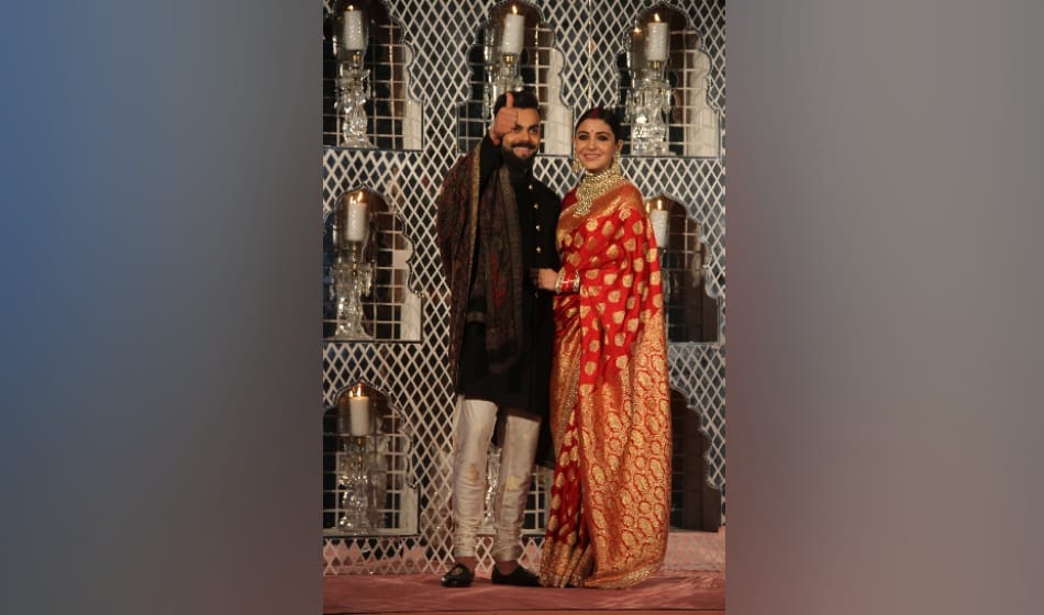 anushka wore red saaree in her reception