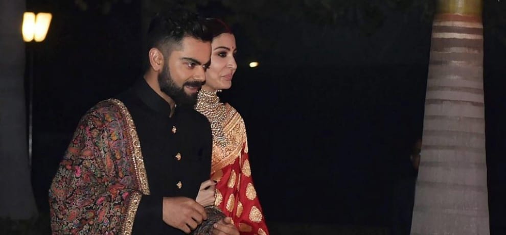 fashion designer Sabyasachi  designed viruska's reception look
