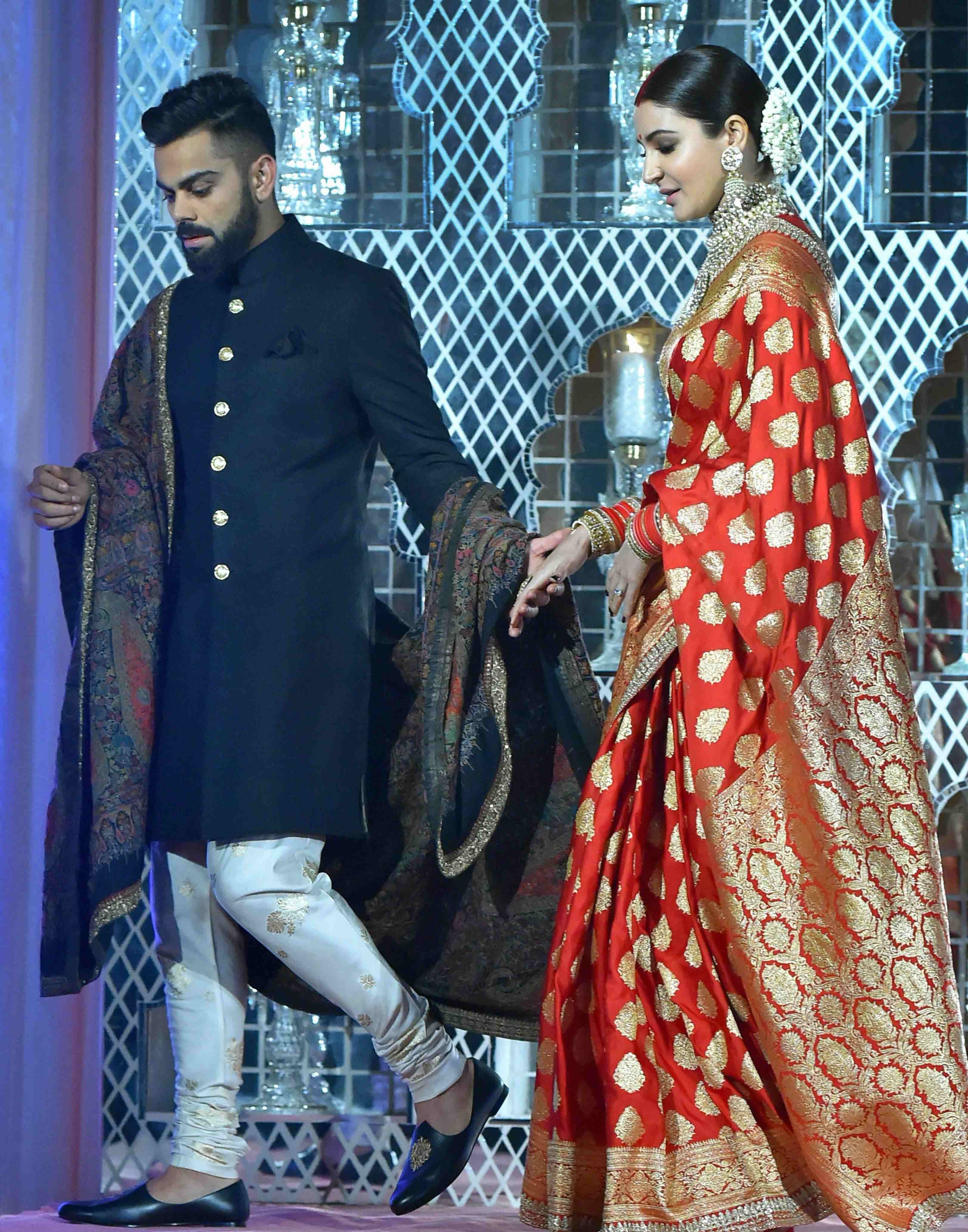Anushka wearing banarasi sari at wedding reception