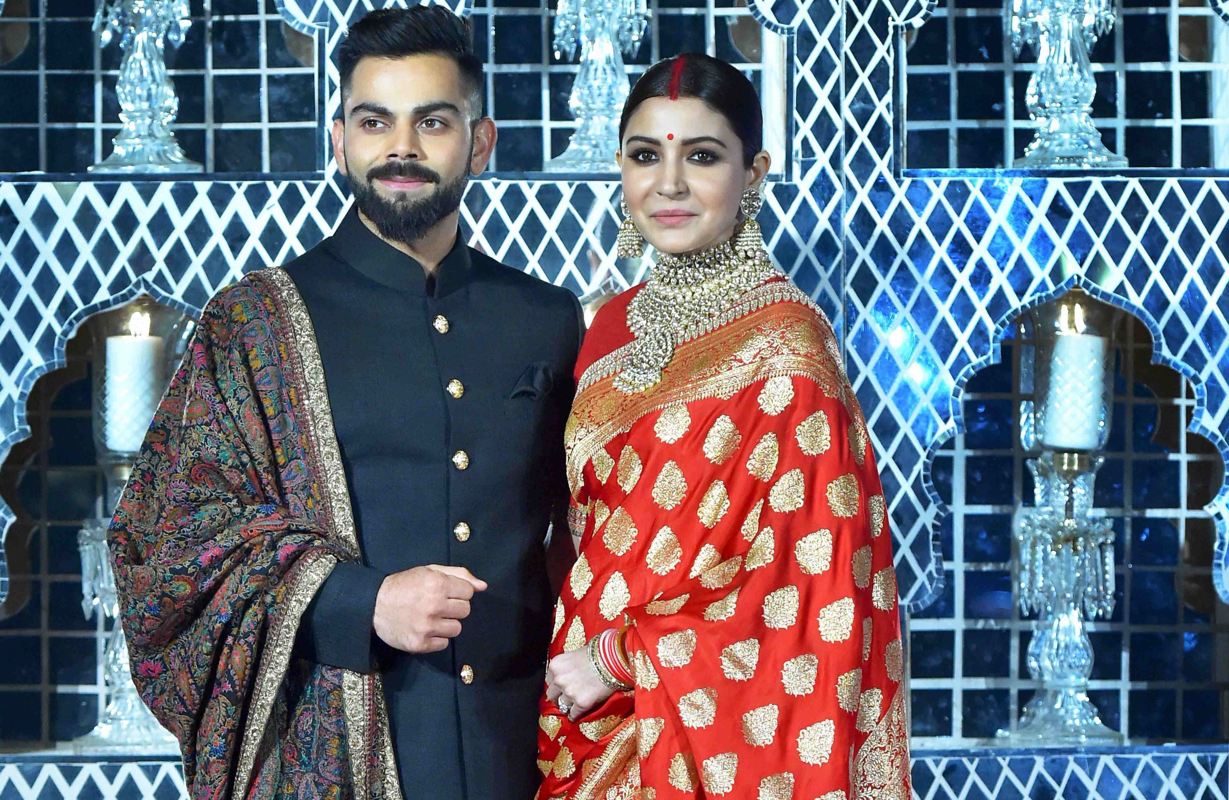 Anushka wearing banarasi sari at wedding reception