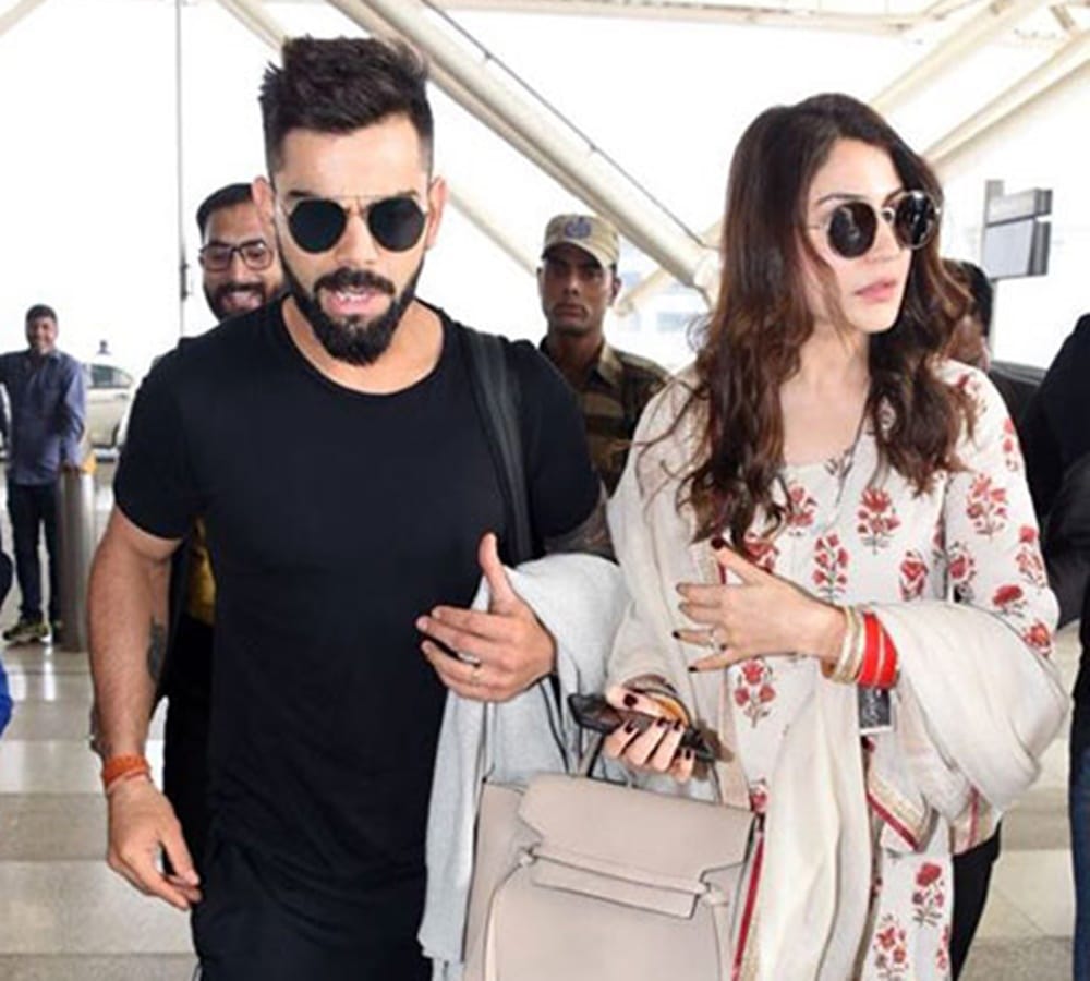 anushka sharma and virat kohli spotted at delhi airport
