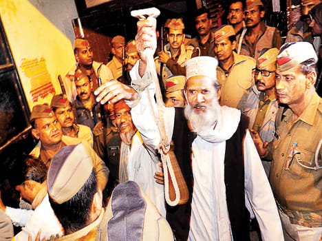 Life imprisonment for 18 including four brothers in double murder