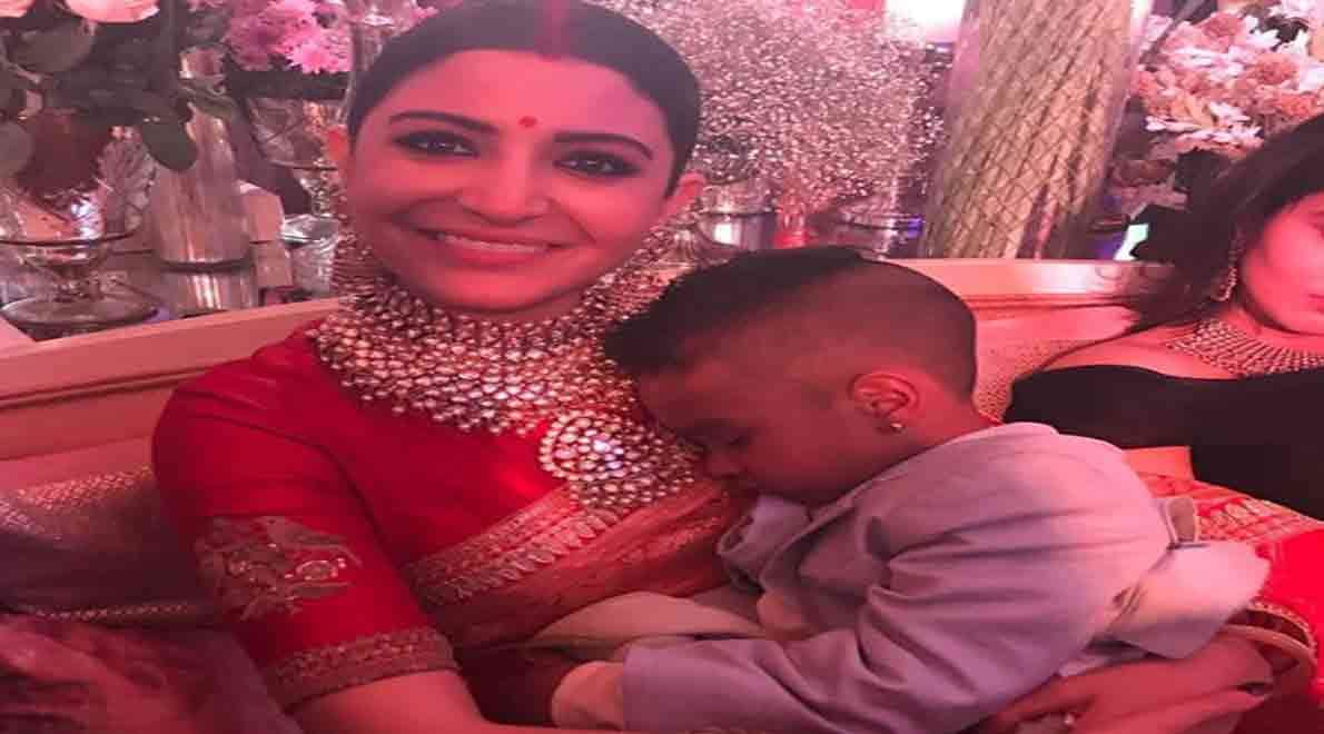 zorawar dhawan in lap of anuskha sharma in reception people give comments