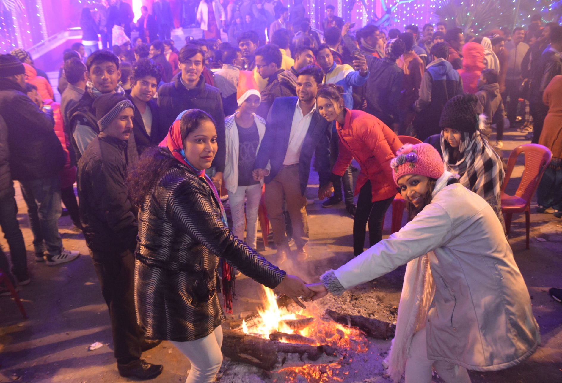 youth crazy for selfi and bone fire party on christmas eveing