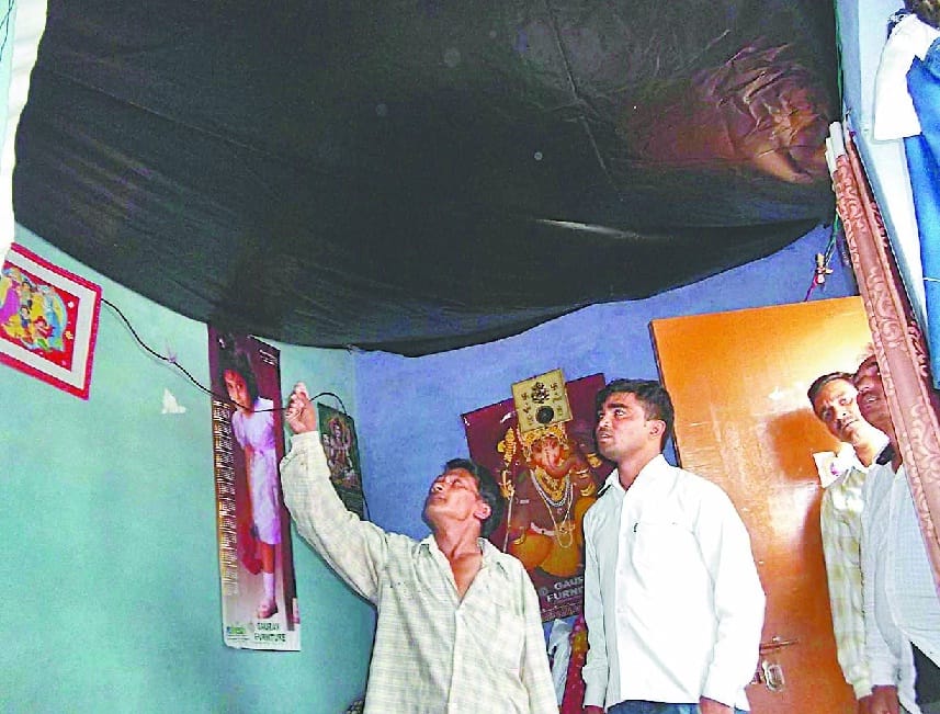 Late in the slum housing scheme and also in Dark