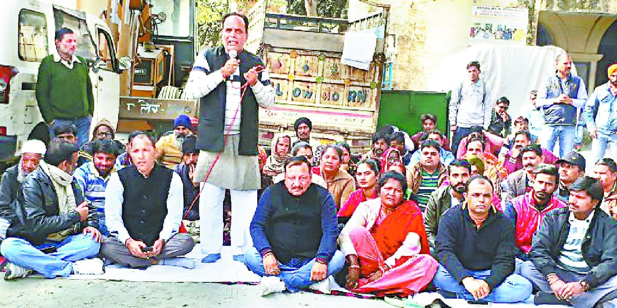 Congressman sitting on a protest against unilateral action 