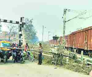 Signal fail. Goods train stops at crossing.