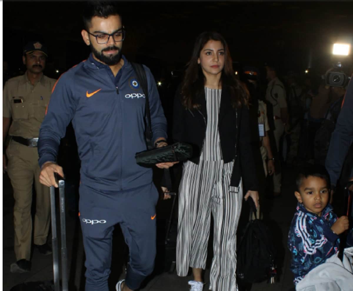 After mumbai reception virat kohli and anushka sharma leaves for south africa