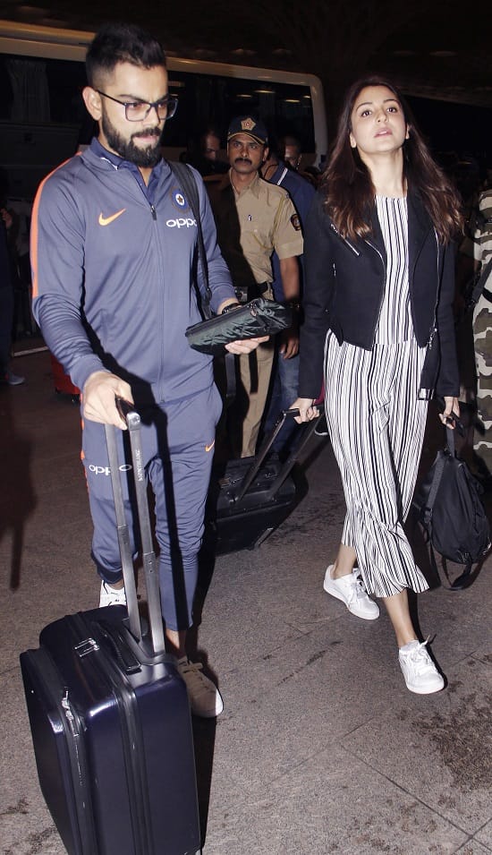 After mumbai reception virat kohli and anushka sharma leaves for south africa
