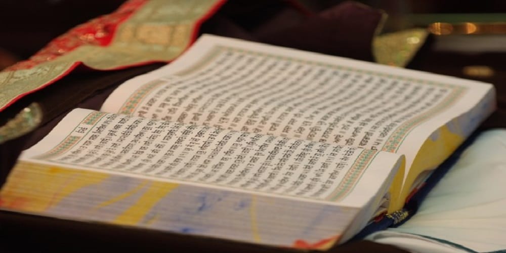 guru granth sahib taken to marriage venue- sikh community showed heavy protest 