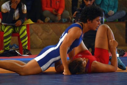 pooja danda defeated gita fogat in trials for commonwealth ticket.