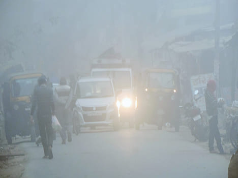 City covered with fog sheet