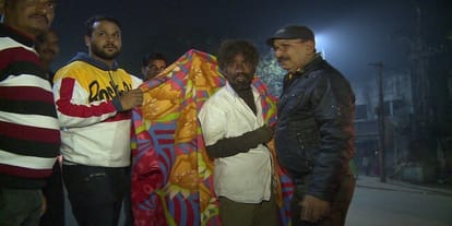 Smile on the faces of people sleeping on the footpath, said Happy New Year