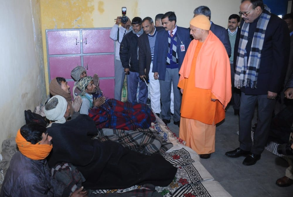 yogi adityanath visits a rain basera in lucknow.