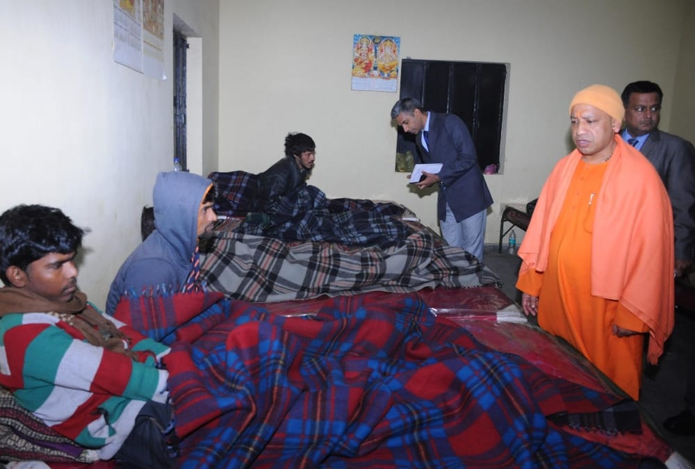 yogi adityanath visits a rain basera in lucknow.