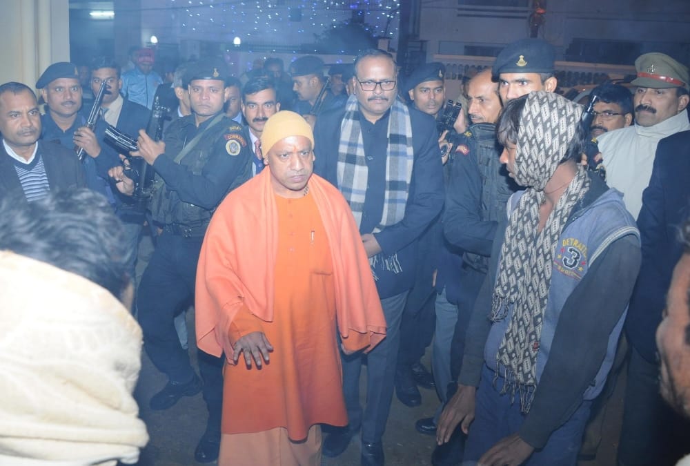 yogi adityanath visits a rain basera in lucknow.