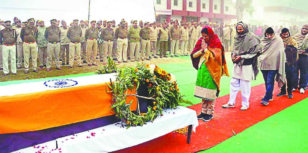 Bowing down to martyrdom, every eye damp