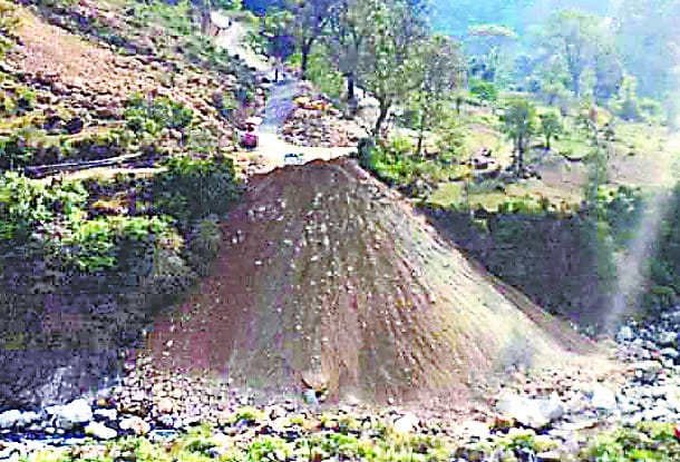 Gathera Pata from debris derived from road reconstruction work