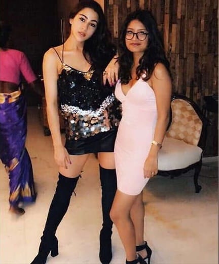 Sara ali khan looking hot in black outfit in Kareena Kapoor Khans Christmas party