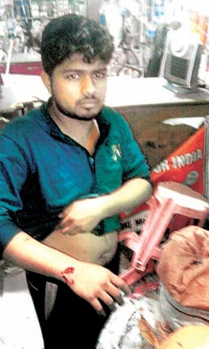 BJP leader's showroom bomb, son injured