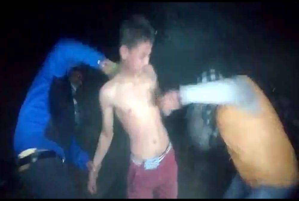 horrible photos of Half naked minor boy beaten by miscreants in shaktifarm