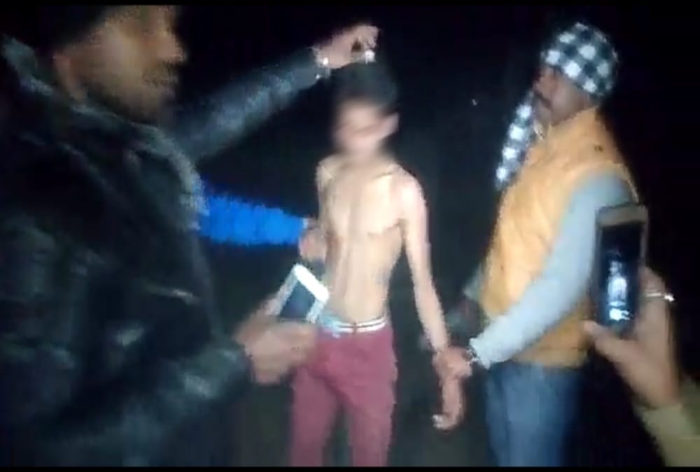 horrible photos of Half naked minor boy beaten by miscreants in shaktifarm