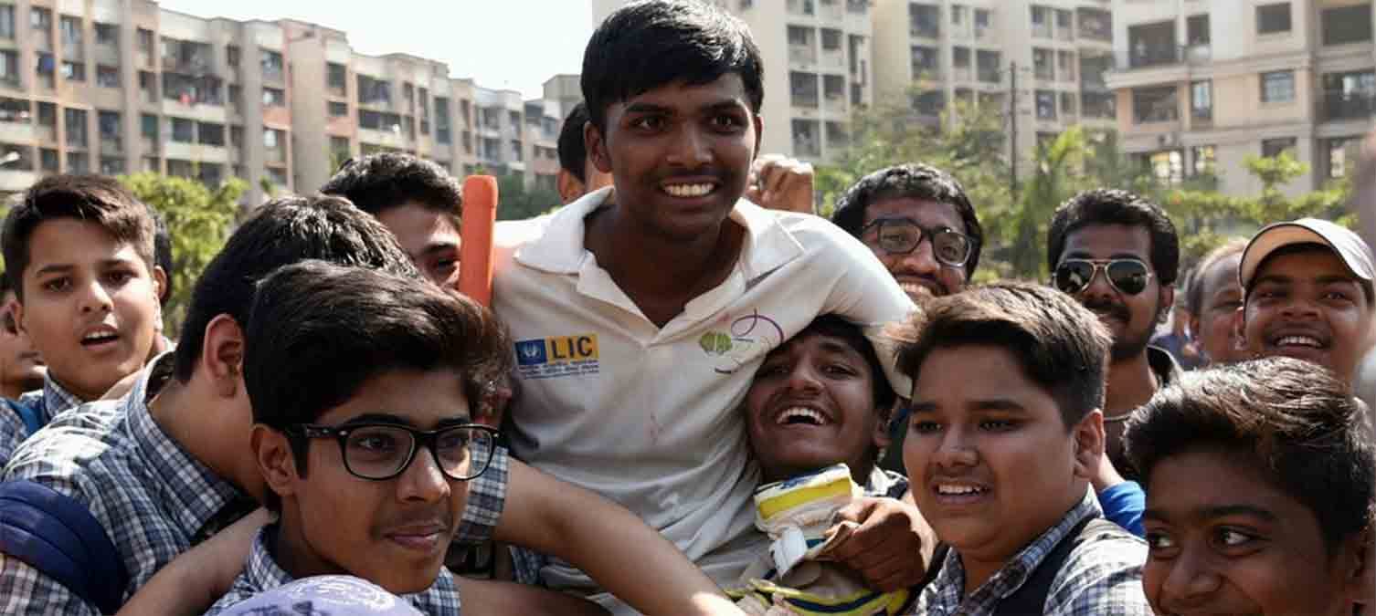 pranav dhanawade hits double century on his second anniversary of thousand runs innings