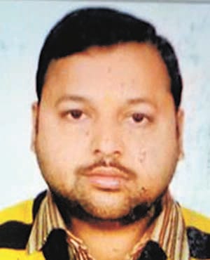 Head home husband shot dead