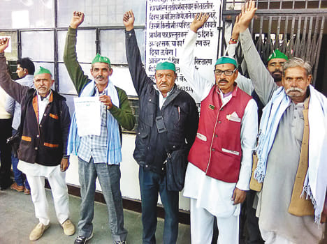 Display of angry farmers with increased electricity rates