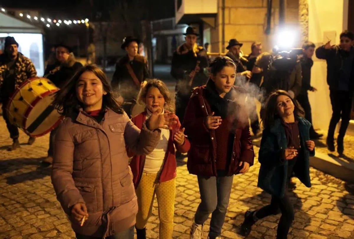 Children smoke cigarettes in this village celebrates traditional Epiphany 