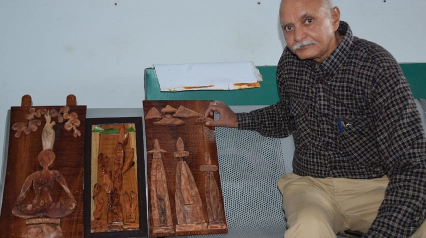 Vibrant artworks making Dhirendra with pine bark