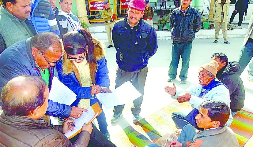 Accused of possession of land, retired personnel sitting on the dock