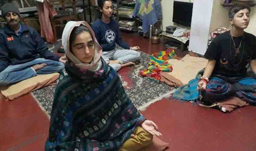 Muslin girl learn yoga in varanasi