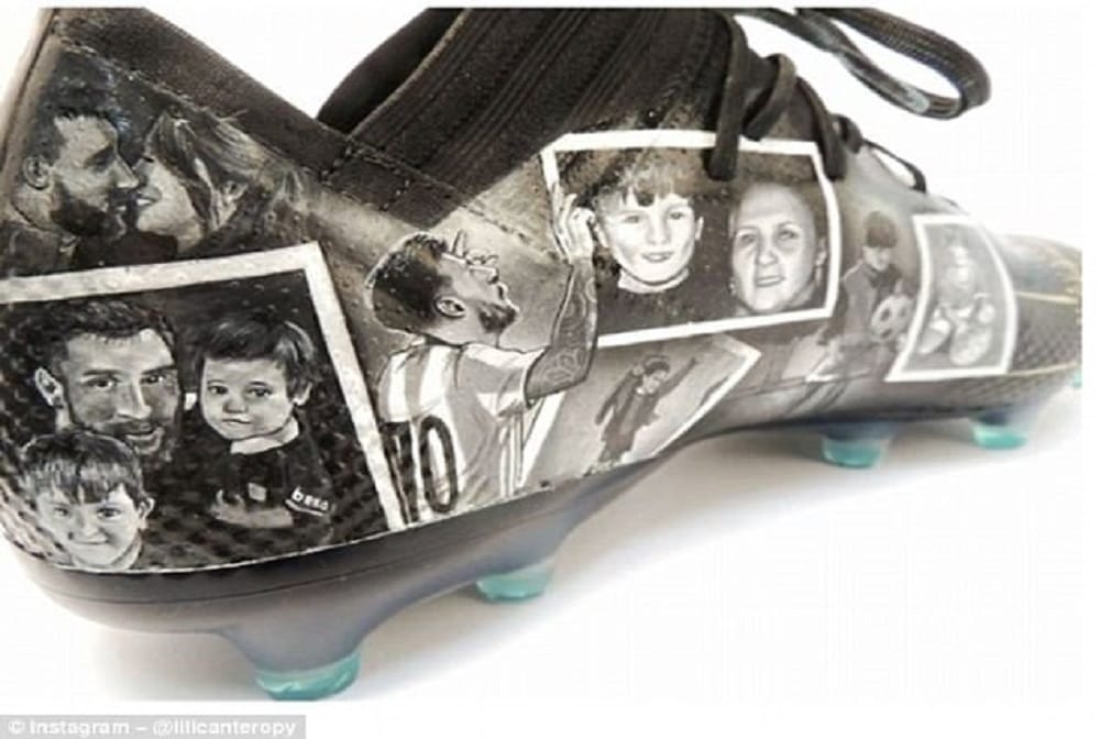 Lionel Messi receives a pair of hand-painted boots telling the story of the his career