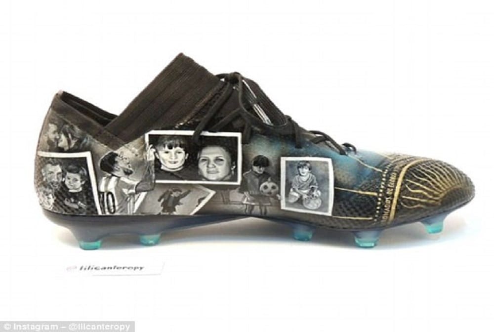 Lionel Messi receives a pair of hand-painted boots telling the story of the his career