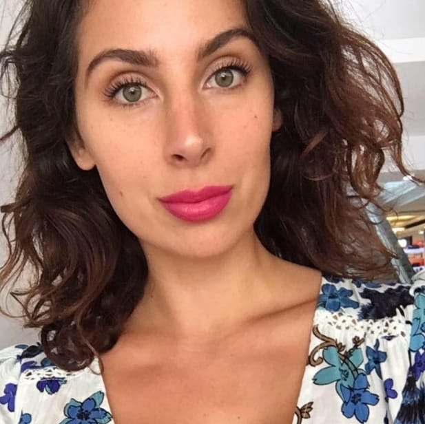An Australian woman rub period blood on her face