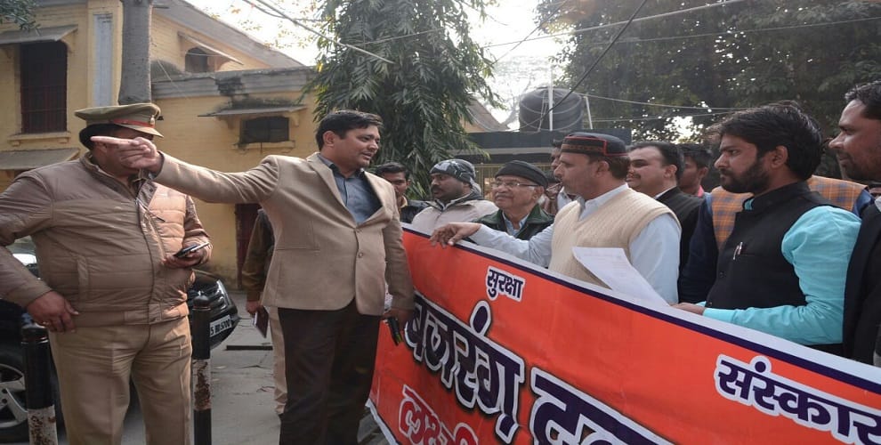 Togadia tremendous protests from lodging lawsuit, sloganeering
