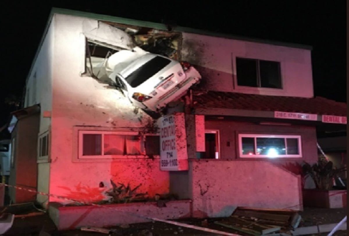 Driver crashes car into second story of a building at California 