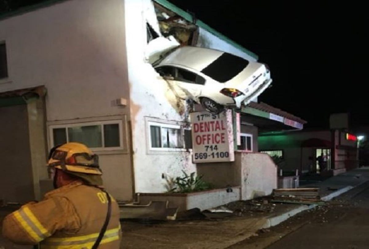 Driver crashes car into second story of a building at California 