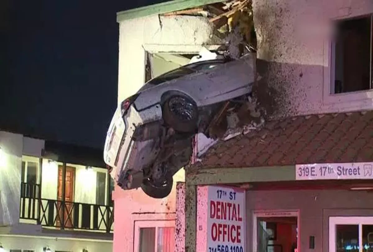 Driver crashes car into second story of a building at California 