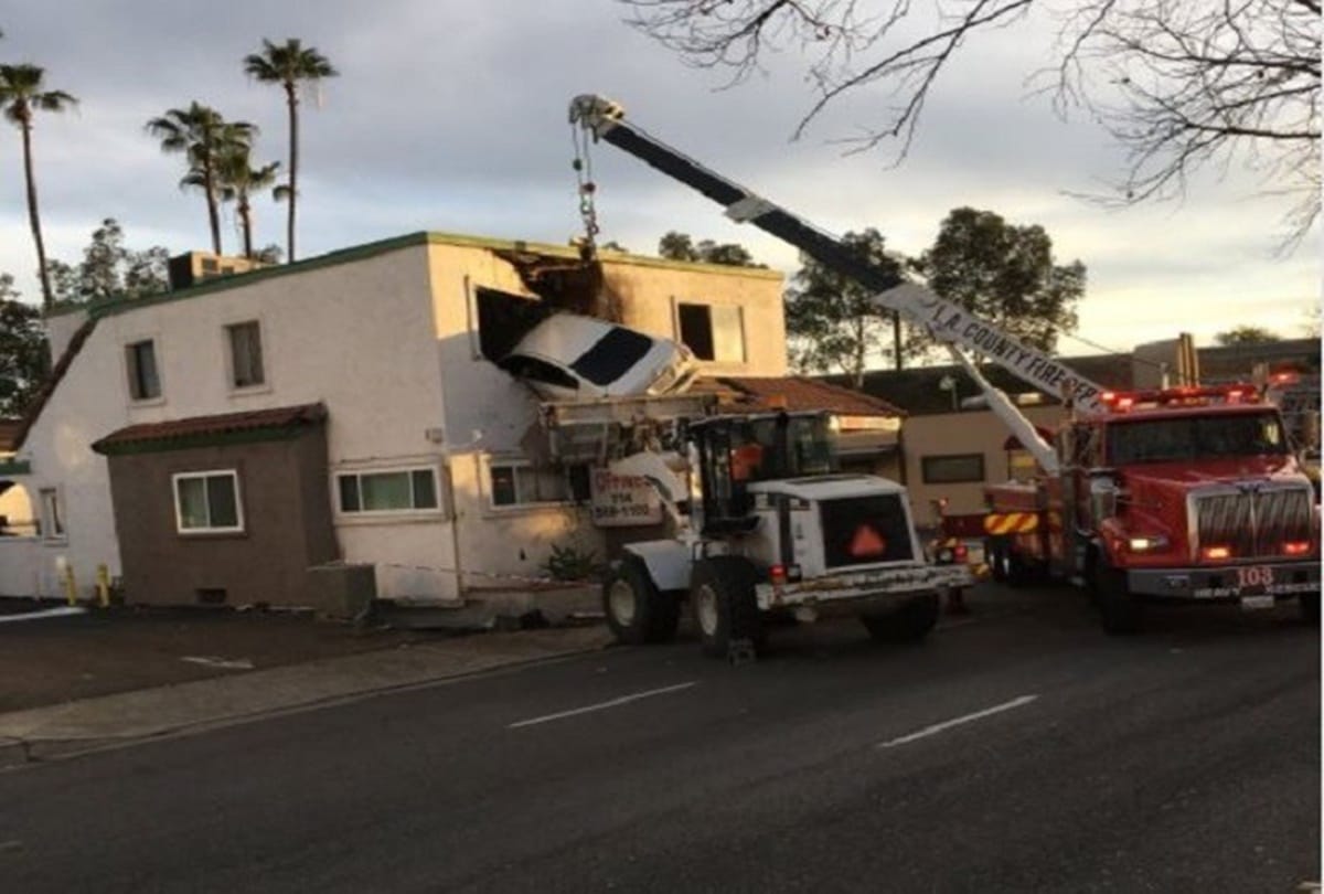Driver crashes car into second story of a building at California 