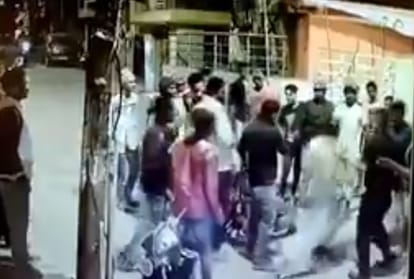 Drunken gang dancing in middle of the road assault two men and a woman