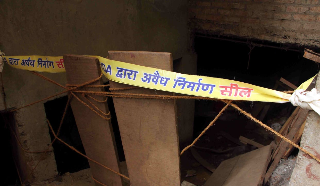 action taken against illegal construction in varanasi busy market